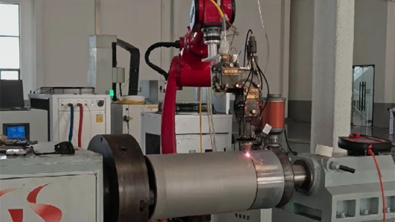 Laser cladding by a robot Laser cladding by a robot