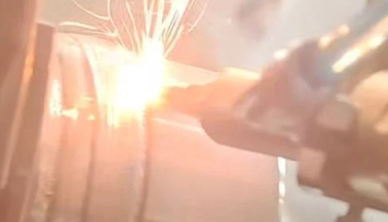 Laser Cladding Process with Paraxial wire Feeding 1 Laser Cladding Process with Paraxial wire Feeding 1
